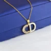 Stainless steel necklace with a gold-plated pendant