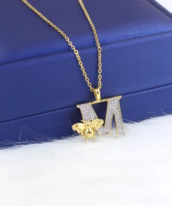 Stainless steel necklace with a gold-plated pendant